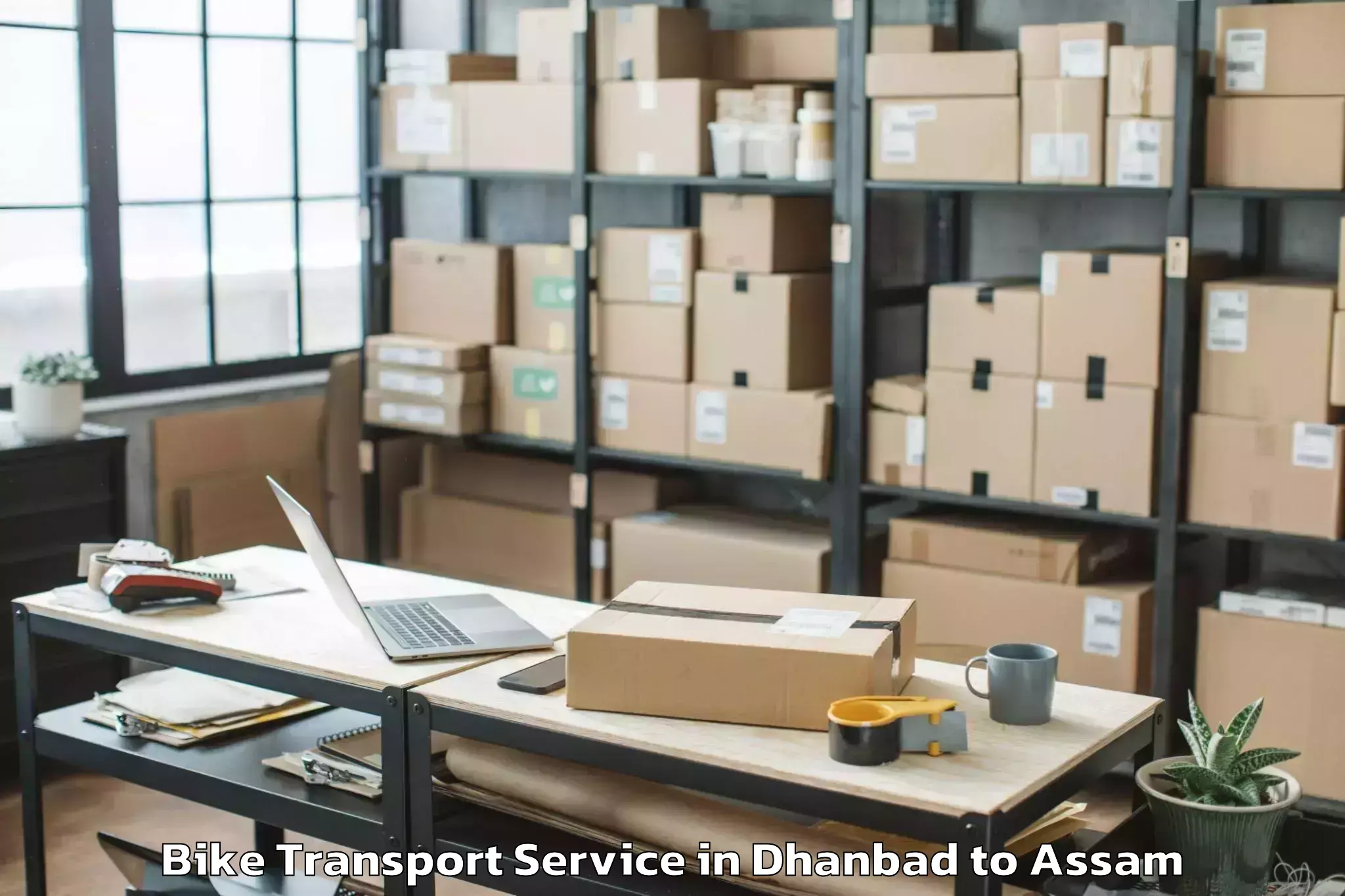 Book Dhanbad to Bongaigaon Pt Bike Transport Online